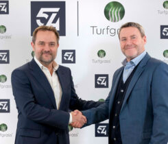 54 CEO Ed Edwards with Turfgrass founder John Clarkin. Photo: 54