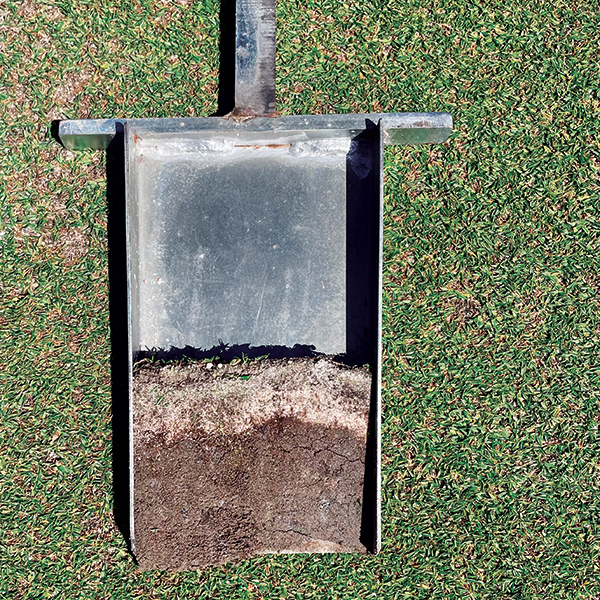 The soil used for the putting green rootzones was obtained from the island. This local soil is frequently amended with sand to continue the process of improving the overall structure and function of the rootzone.
This soil profile represents a 2-year-old putting green. Local island sand is screened to obtain the sand size needed, which is typical for working in the Caribbean — improvise, find creative solutions and do it all in-house. (Photo: Damon Di Giorgio)