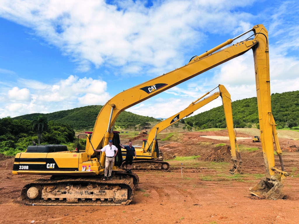 Building a new golf course requires lots of “big iron,” such as this pair of Caterpillar 330B workhorses. (Photo by: heritage links)
