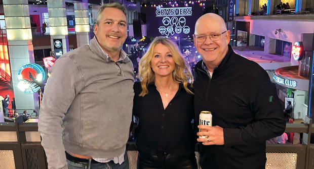 Party crashers: These three are never late for a Crashers concert — a cover band that performs every year at Equip Expo in Louisville, Ky. MacGregor and Hollister are joined by their concert buddy Lynette Von Minden, Swanson Russell. (Photo: Golfdom staff)
