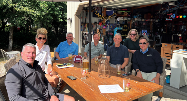 It’s a PBI party!: What a thrill! Team Golfdom was joined by team PBI-Gordon at Seth’s party garage, the HOJ (that stands for Hall of Justice — not House of Jones, btw). From left to right are MacGregor, Callie Zevecke Pestock, Jones, Jared Hoyle, Ph.D., Roddy, Melissa McDonald and Andy Scott. Shuffleboard, anyone? (Photo: Golfdom staff)