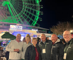 Jones with the team from PBI-Gordon, and outgoing GCSAA president T.A. Barker. Only now does Jones realize why he kept seeing the PBI-Gordon folks in that area. Still, the Ferris wheel at ICON Park looks cool. (Photo: Golfdom staff)