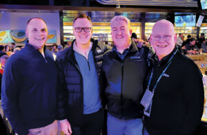 A handshake deal: The team at Golfdom has enjoyed the work of Andy Staples, ASGCA (second from left), over the years — that includes his golf course designs as well as his e-newsletter. And this photo is the official announcement that Staples will soon be writing a column for Golfdom. With Staples are Golfdom’s Kevin Stoltman, CEO; Seth Jones, editor-in-chief; and Scott Hollister, editor. (Photo: Golfdom staff)