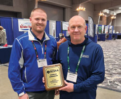South Dakota Superintendent of the Year: Congratulations to Charles Kornmann (right), superintendent at Lee Park GC, Aberdeen, S.D., on being named the South Dakota SOTY, with Josh Waltman, Lee Park GC, presenting him the award. (Photo: Golfdom staff)