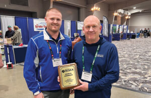 South Dakota Superintendent of the Year: Congratulations to Charles Kornmann (right), superintendent at Lee Park GC, Aberdeen, S.D., on being named the South Dakota SOTY, with Josh Waltman, Lee Park GC, presenting him the award. (Photo: Golfdom staff)