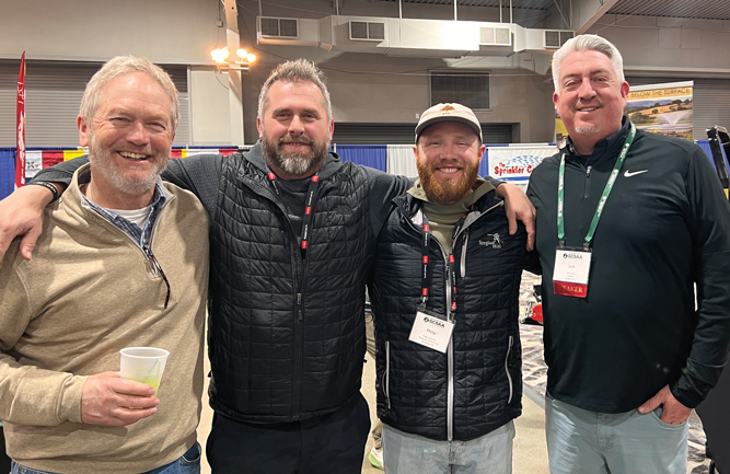 All in the family: (Left to right) Matt Enderson, retired superintendent at CC of Sioux Falls — now happy to be a member of the crew — with Jeff DeWolf, CC of Sioux Falls superintendent; Matt Enderson’s son Philip Enderson, superintendent at Brookings (S.D.) CC; and Golfdom Editor-in-Chief Seth Jones. (Photo: Golfdom staff)
