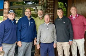 Paul Jett, CGCS (center in gray shirt) with from left, Carolinas GCSA board director Todd Lawrence, CGCS; vice president Jeremy Boone, CGCS, MG; executive director Tim Kreger; president Brain Green; and past president Doug Lowe, CGCS (Photo: Carolinas Golf Course Superintendents Association)