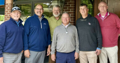 Paul Jett, CGCS (center in gray shirt) with from left, Carolinas GCSA board director Todd Lawrence, CGCS; vice president Jeremy Boone, CGCS, MG; executive director Tim Kreger; president Brain Green; and past president Doug Lowe, CGCS (Photo: Carolinas Golf Course Superintendents Association)