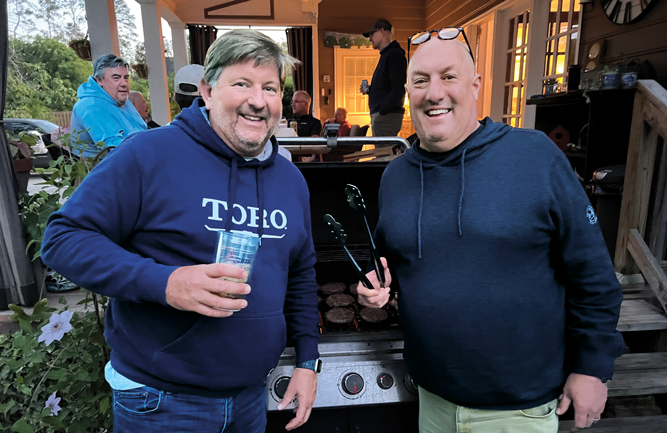 The grill guys: Rumor has it there was a 3-foot flame coming off the grill the previous night, but Chris Anderson and Mike Read, The Toro Co., got that situation under control. Thanks for the food, guys! (Photo: Golfdom staff)