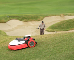 Schriever says his autonomous mowers don’t remove the need for people, but they do allow his crew to perform other tasks, like raking and hand-watering. (Photo: Kress)
