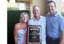 Native bird advocate Brian Beckner (middle) with wife, Susan, and his award from the Florida GCSA presented by president Ryan Swilley, CGCS (right), from The Dye Preserve Golf Club. (Photo: Florida GCSA)