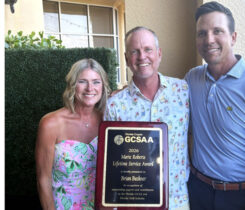 Native bird advocate Brian Beckner (middle) with wife, Susan, and his award from the Florida GCSA presented by president Ryan Swilley, CGCS (right), from The Dye Preserve Golf Club. (Photo: Florida GCSA)