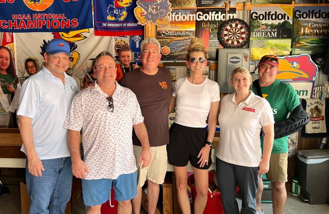 FOG at the HOJ: That's Friends of Golfdom at the Hall of Justice. For the Friday of March Madness, Golfdom opened the garage door and welcomed (left to right) Jeff Eldridge, CGCS, Nufarm; Cummins and Jones Golfdom; Callie Zevecke, PBI-Gordon; Dani McFadden, Ph.D., PBI-Gordon; and Jeff White, CGCS, indian Hills CO, Mission Hills, Kan. Jeff, you forgot your cooler (don't worry, it's empty now)!(Photo: Golfdom staff)