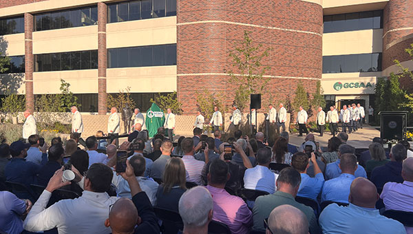 The 27 past GCSAA presidents in attendance are led by a bagpiper to begin GCSAA’s 100-year celebration. (Photo: Golfdom Staff)